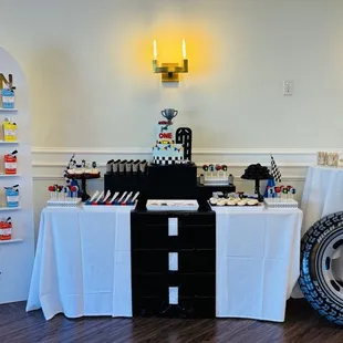 a table set up for a mickey mouse birthday party