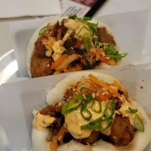 two buns with meat and vegetables