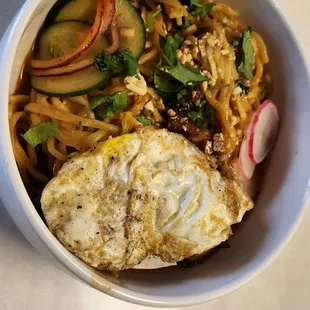 Garlic noodles with chicken and fried egg