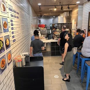 Line up and order by just letting the all in one guy know.  Then he&apos;ll ring you up as he is almost complete with putting things together