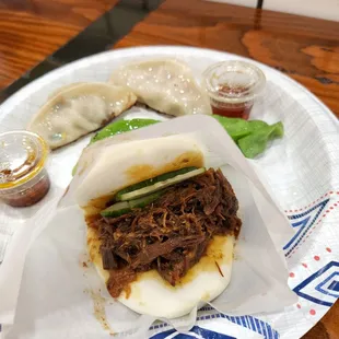 Bao, chicken and pork dumplings