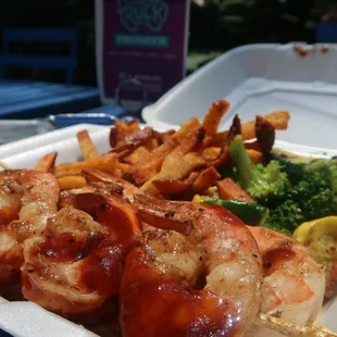 Shrimp with fries and veggies