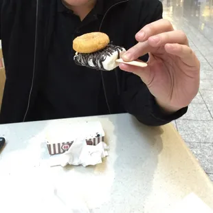 Double stacking cinnamon donut over coconut chocolate sorbet!