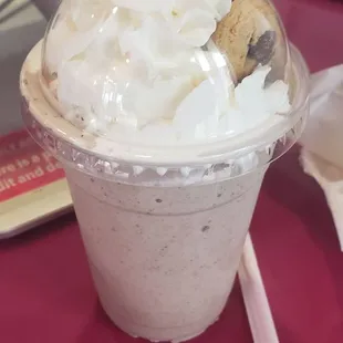 a dessert in a plastic cup