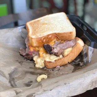 Pork and cheese deluxe: pulled pork, pimento cheese, and Mac and cheese on Texas toast!