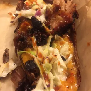 Potato skins with pimento cheese, pulled pork and Coke slaw - like eating heaven.