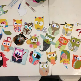Making paper owls at the August Artist Reception with Feed the Fish co.
