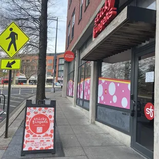 a sign on the sidewalk