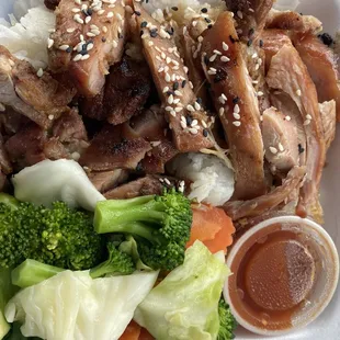 Boneless honey glazed chicken in white rice