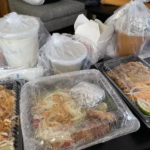 Chicken pad Thai, som tam/green papaya salad, shrimp pad Thai, Tom ka soup, clear soup and egg rolls, duck panang curry