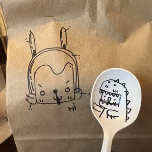 Cute drawings on the take out and the spoon attached to pen!!