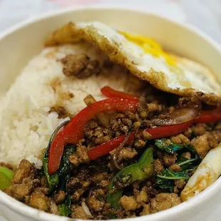 Grapow Chicken (stir fried garlic chili basil) added fried egg on top