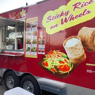 a man standing in front of a food truck