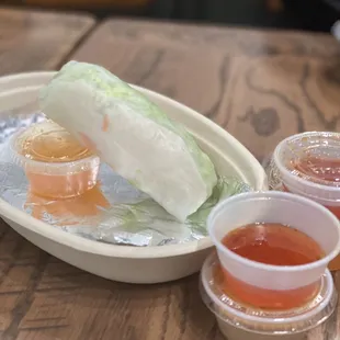 a plate of lettuce and sauces