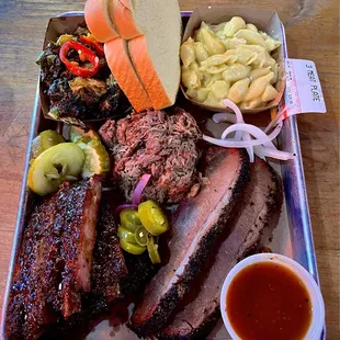 3 Meat Plate: brisket, St. Louis Pork Ribs, Pulled Pork with side of Sweet Serrano Fried Brussel Sprouts and Mac &amp; Cheese