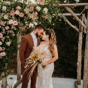 Wooded ceremony site with our tree arbor