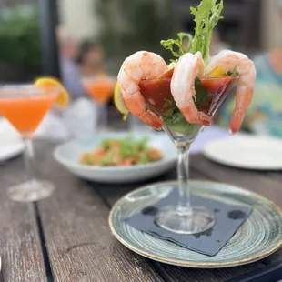 a glass of shrimp cocktail