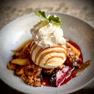 a dessert with ice cream and fruit