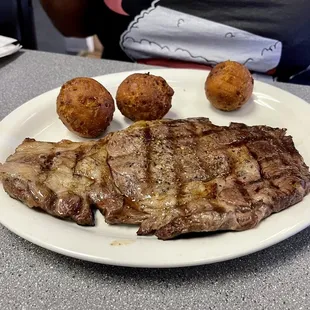 Ribeye with hush puppies