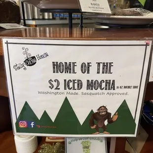 a sign for the home of the $ 2 iced mocha