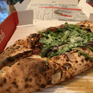 Merguez Pide​ (shredded mozzarella, house made lamb sausage, tabouleh​)​