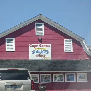 a car parked in front of the building