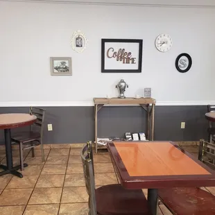 tables and chairs in a coffee shop