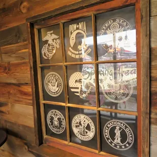 a window with a variety of logos