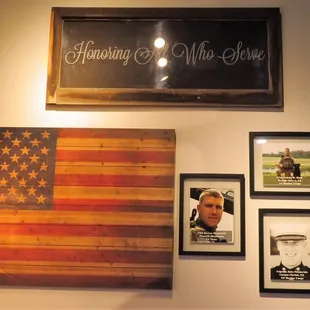 an american flag and a chalkboard