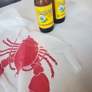 two bottles of beer on a table