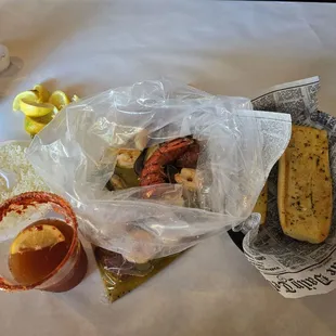 Rice, Michelangelo, lemon pepper sea food boil and garlic bread