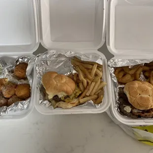 Cheesy bacon potato balls, kids cheeseburger and fries, Black and Bleu Burger with onion rings.