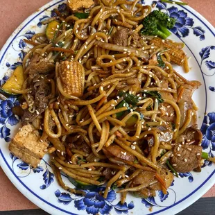 a plate of stir fried noodles