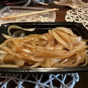 Here are all the onions I had in my plate the small amount of beef was ridiculous. They put a whole onion in here.