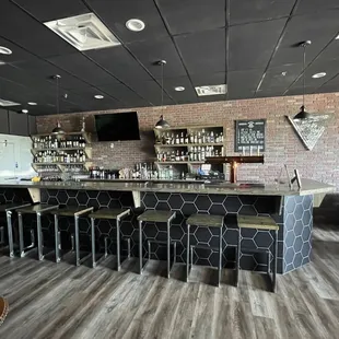 a bar with a lot of stools