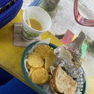 missy's mango smoothie, half of a paddy's melt sandwich, and half of a starvin surfer burrito