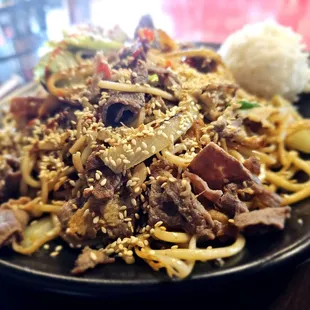 Mongolian bbq noodles with chicken and beef and veggies