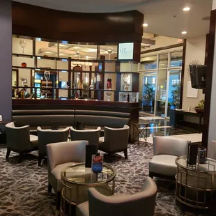 a lounge area in a hotel lobby