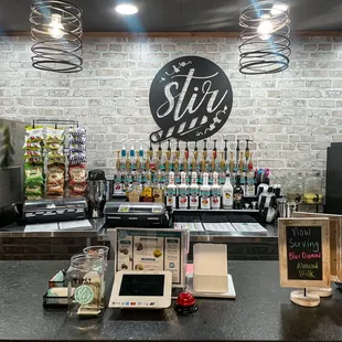 a counter with a variety of beverages