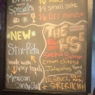 a menu on a chalk board