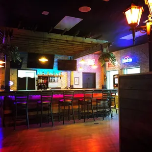 a bar with neon lights