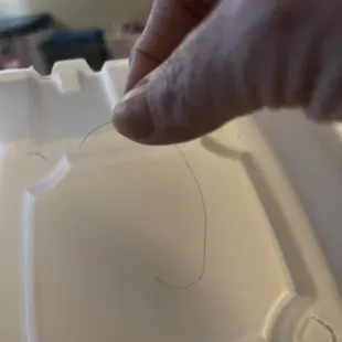 Food lid with hair.