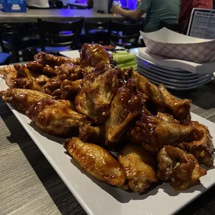 50 wings. They only allow you to choose one sauce. Good though!