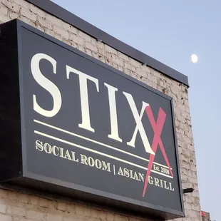 a sign on the side of a building