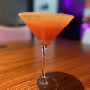 a drink in a martini glass