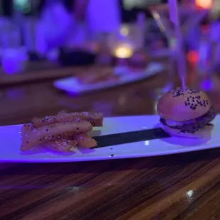 Happy Hour is the Best Hour ! TLB- The Little Burger and 4 Parmesan Truffle Fries ! Trust me it's