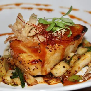 The Miso Glazed Chilean Sea Bass was made with sauteed bok choy, ginger, crispy shallots, &amp; thai basil.