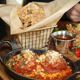 The Giant Wagyu Meatballs are served in a cast iron skillet (HH price $6).