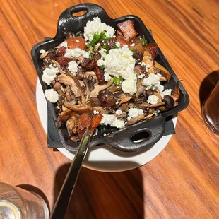 Confit mushrooms with bacon and feta cheese