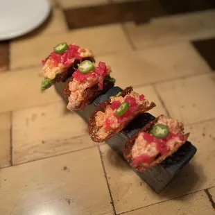 a long piece of sushi on a table
